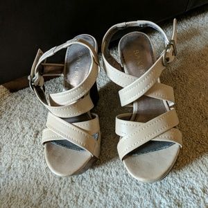 Tan colored strappy platforms